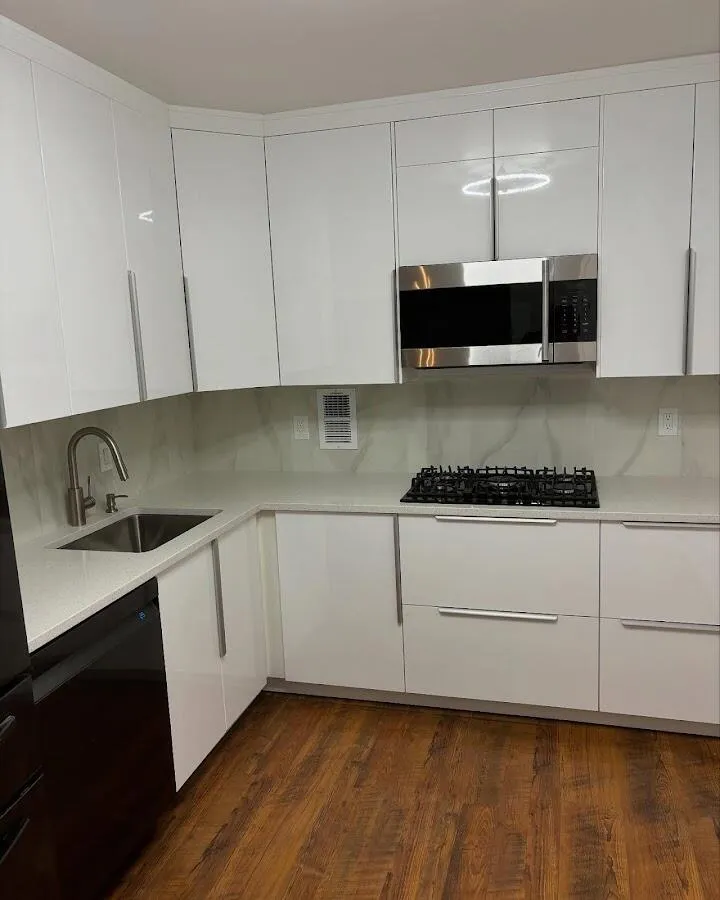 Restored kitchen with white cabinets after water damage in Spencer